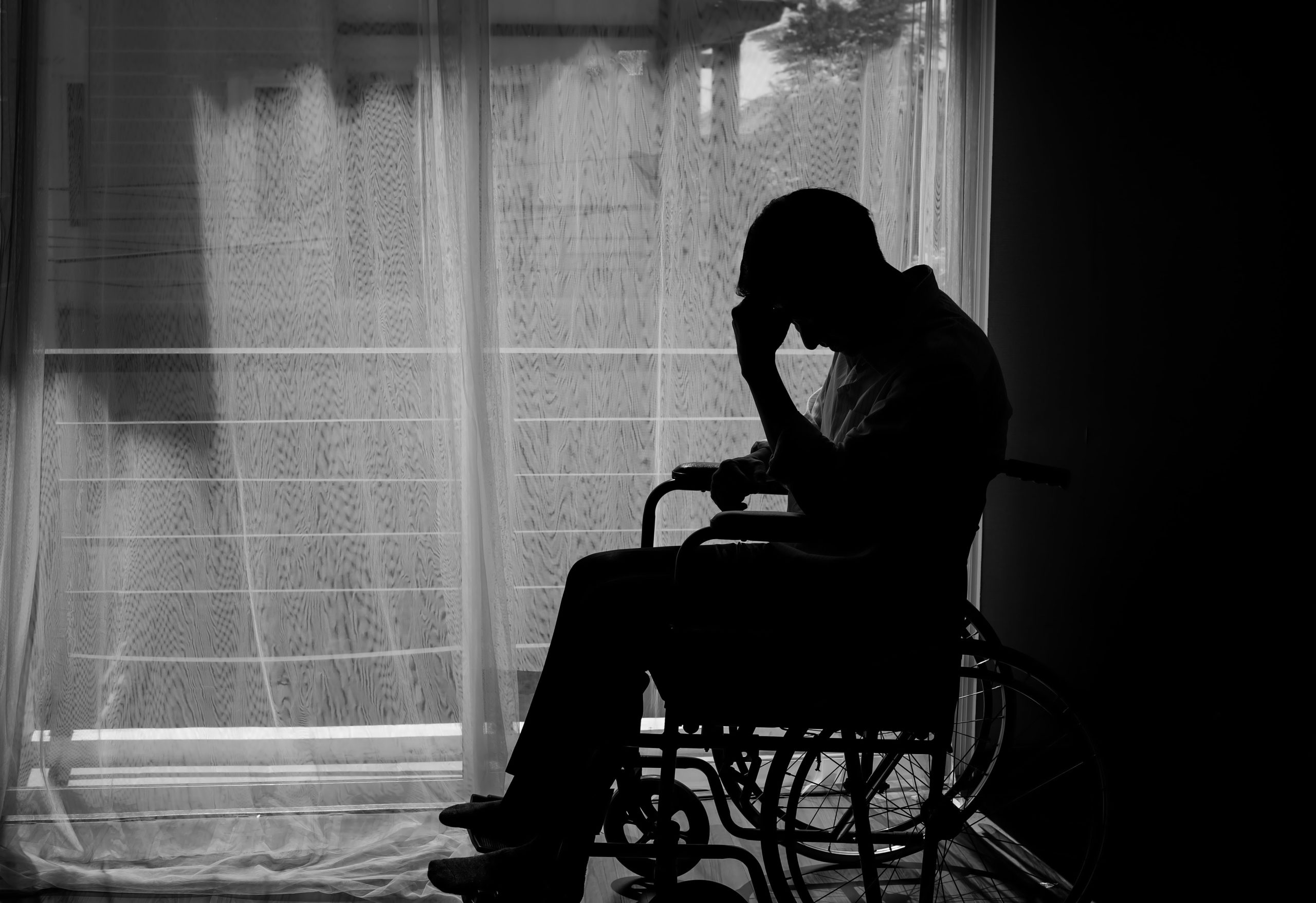 sad handicapped man NY medical claims